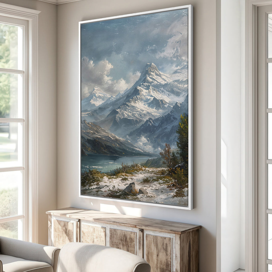 Framed Wall Art of a majestic mountain landscape in a classic, painterly style. Features a cool blue and gray color palette, perfect for any interior.