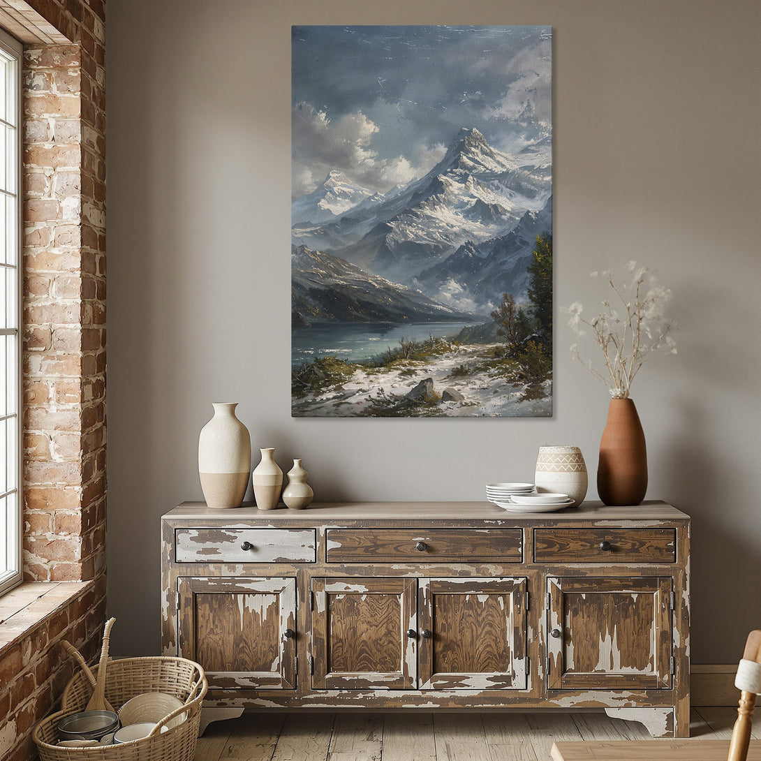 Framed Wall Art: Mountain landscape canvas print in a dining room. Classic art style with cool blue, gray, and white tones. Perfect for home decor.