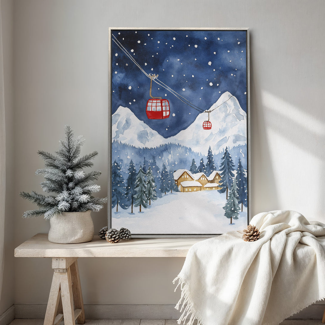 Framed Wall Art: Watercolor winter landscape with ski lift, cabin, and snow-covered mountains in blue and red hues. Perfect for cozy home decor.