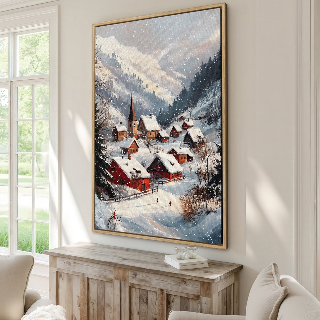 Framed Wall Art: Winter village scene canvas print with snowy mountains, red roofs, and cool blue/white palette. Perfect for cozy home decor.