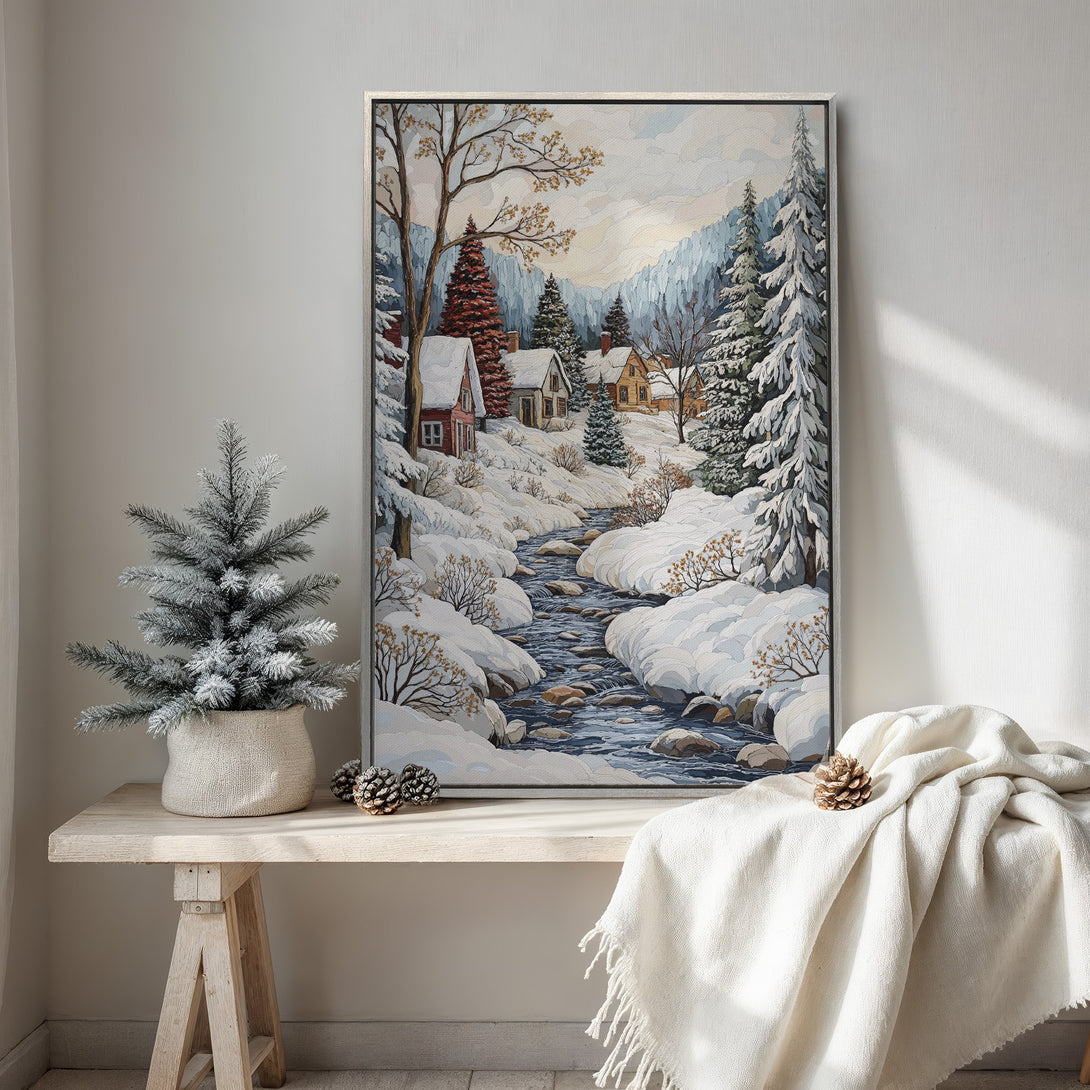 Framed Wall Art: Winter landscape Canvas Print with snowy river and cozy cabins. Warm, inviting color palette perfect for home decor.