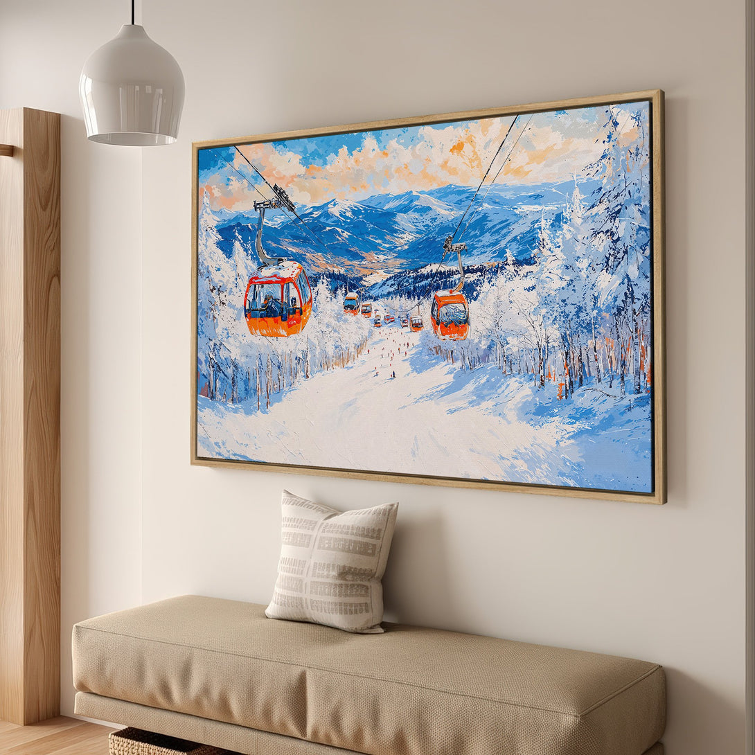 Framed Wall Art of a ski resort scene. Vibrant blue, orange, and white palette. Perfect for adding a touch of winter charm to your home decor.