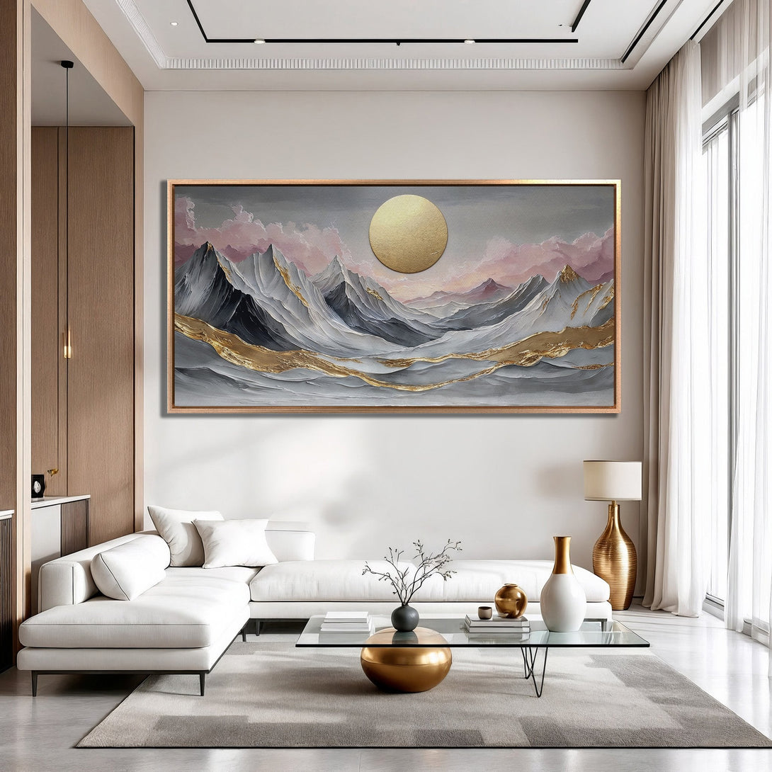 Framed Wall Art: Abstract mountain landscape with gold accents, displayed in a modern living room. Features a neutral color palette with pink and gray tones.