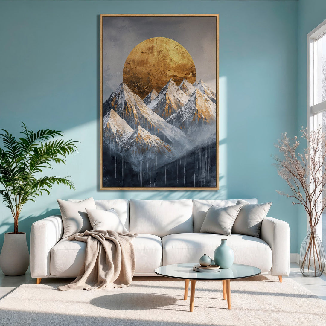 Framed Wall Art featuring an abstract mountain landscape in gold, gray, and white. Modern style canvas print adds a touch of elegance to any living room.