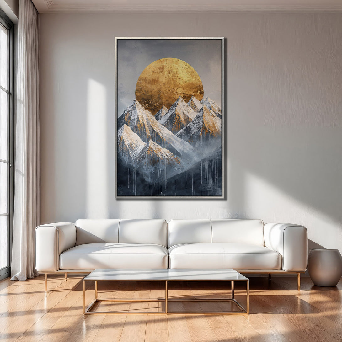 Framed Wall Art featuring abstract mountain landscape with gold and blue tones, displayed in a modern living room.