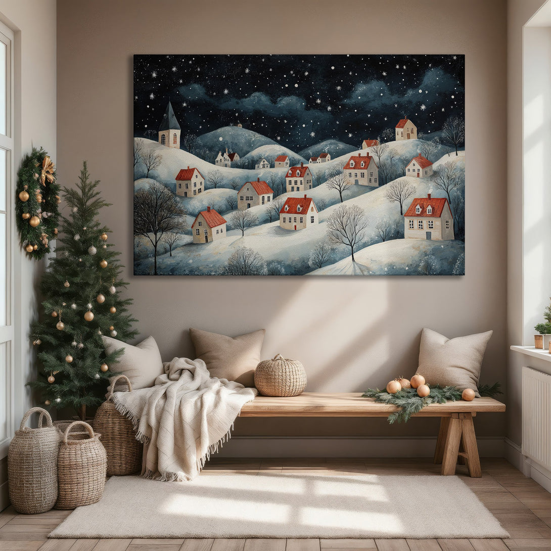 Framed Wall Art featuring a winter village scene with a blue, white, and red color palette. Perfect for cozy home decor!