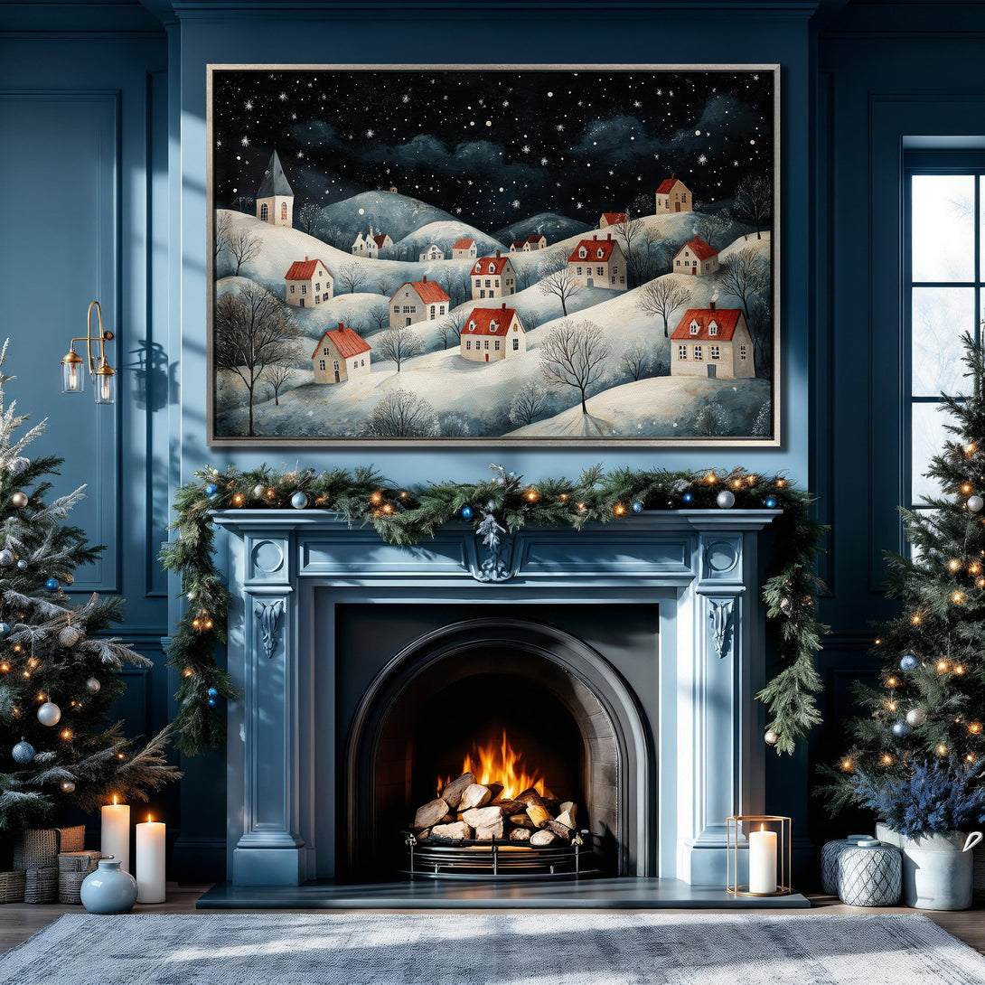 Framed Wall Art: Winter village scene Canvas Print with red roofs, blue and white color palette, perfect for cozy home decor.