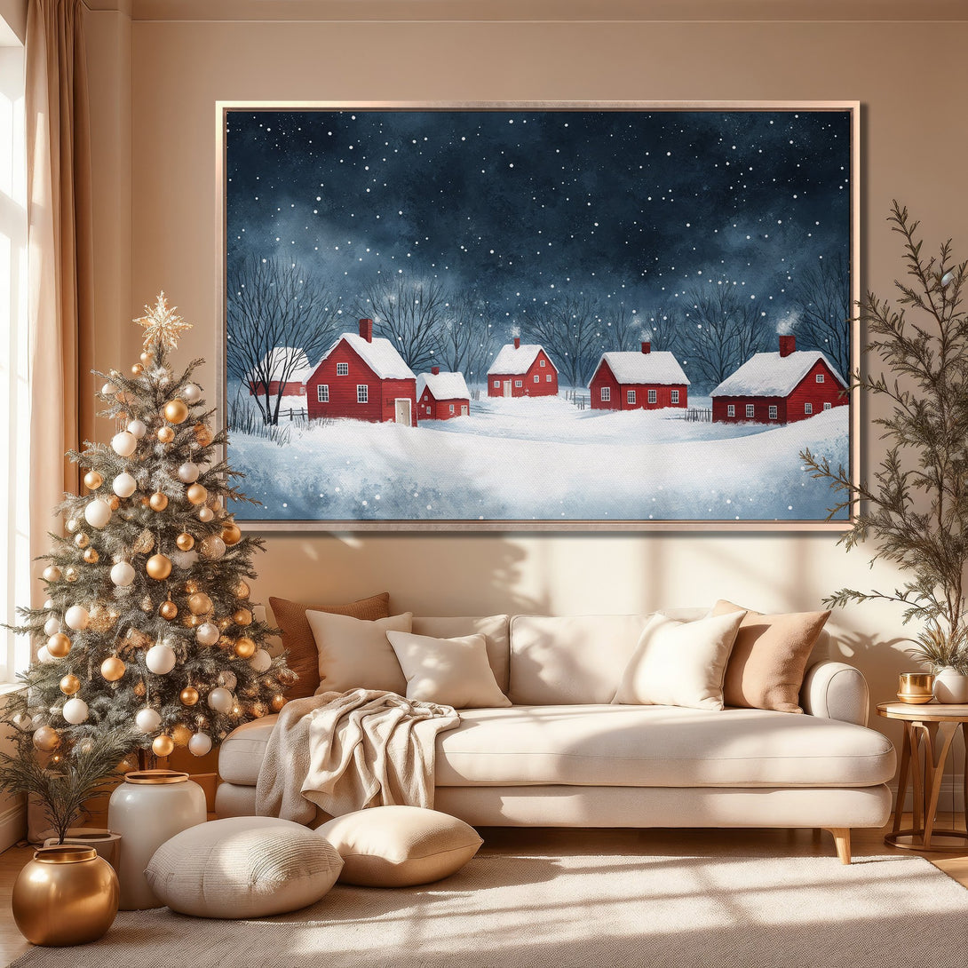 Framed Wall Art: Winter landscape Canvas Print with red houses against a snowy backdrop. Featuring a cozy, warm color palette, perfect for holiday decor.
