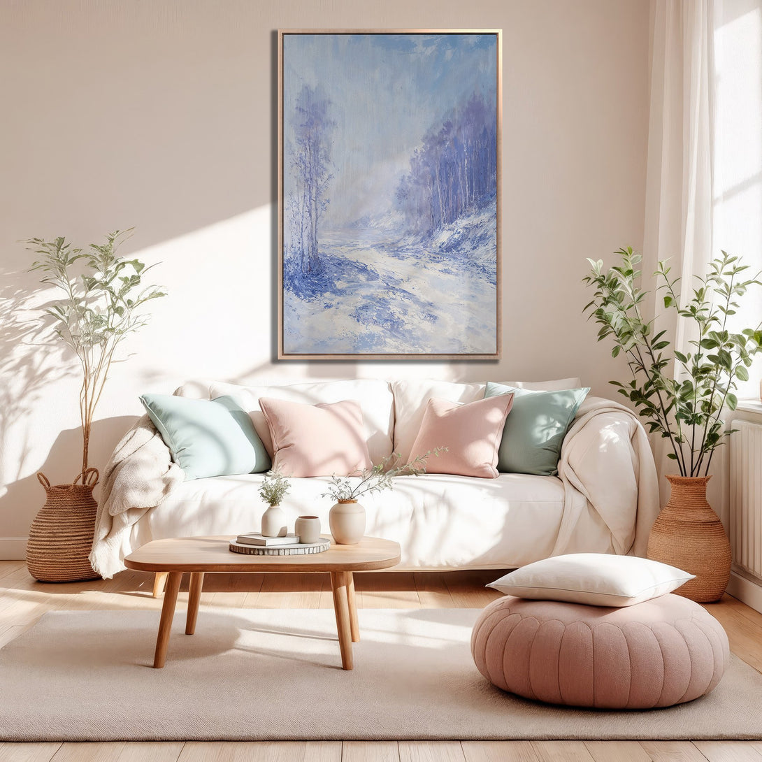 Framed Wall Art: Serene winter landscape Canvas Print in blue and white, adding a touch of nature and tranquility to your living room decor.