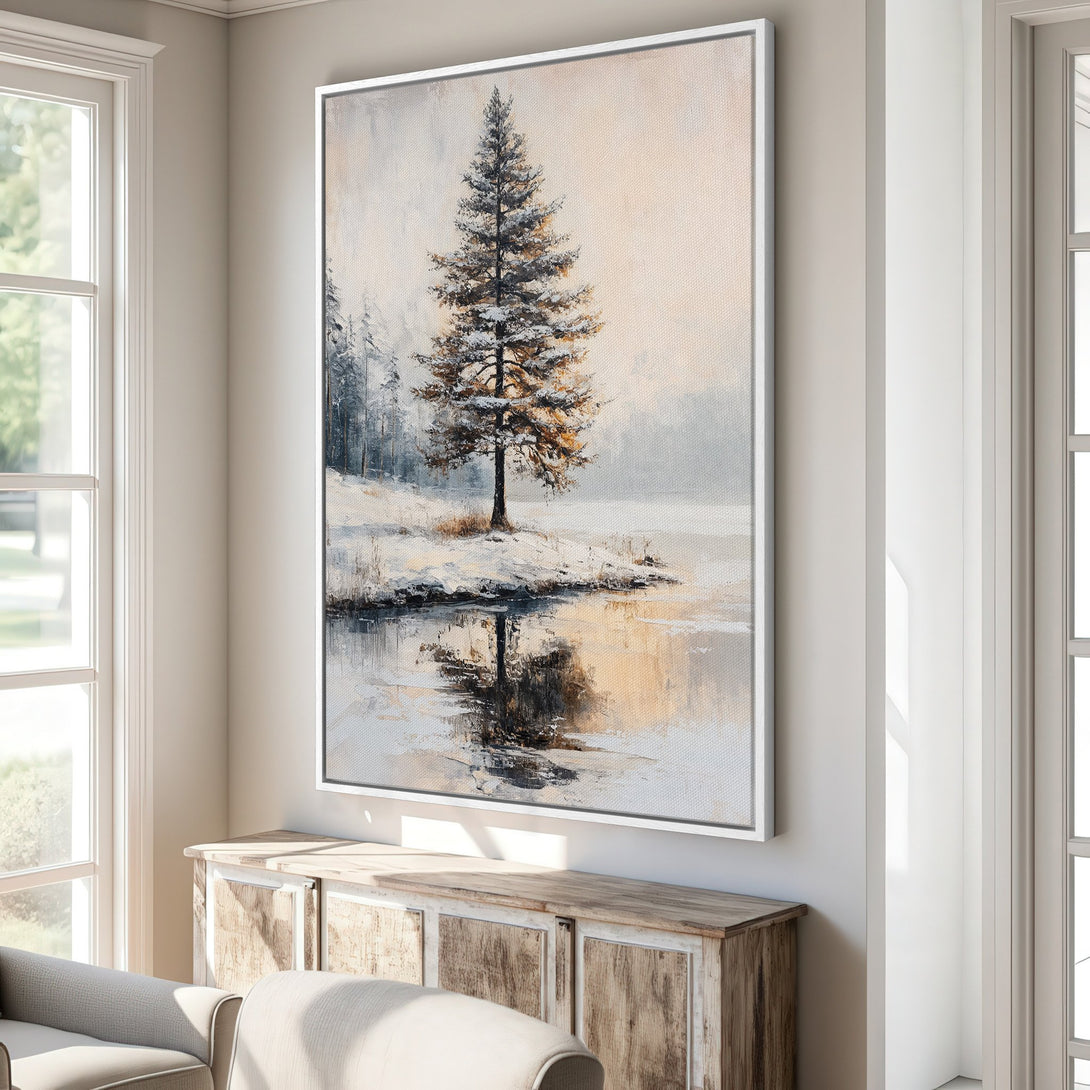 Framed Wall Art: Winter landscape Canvas Print in muted tones. Featuring a snow-covered tree and lake, perfect for adding a touch of nature to your home decor.