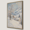 Snowy Village and Mountain Landscape Framed Canvas Print