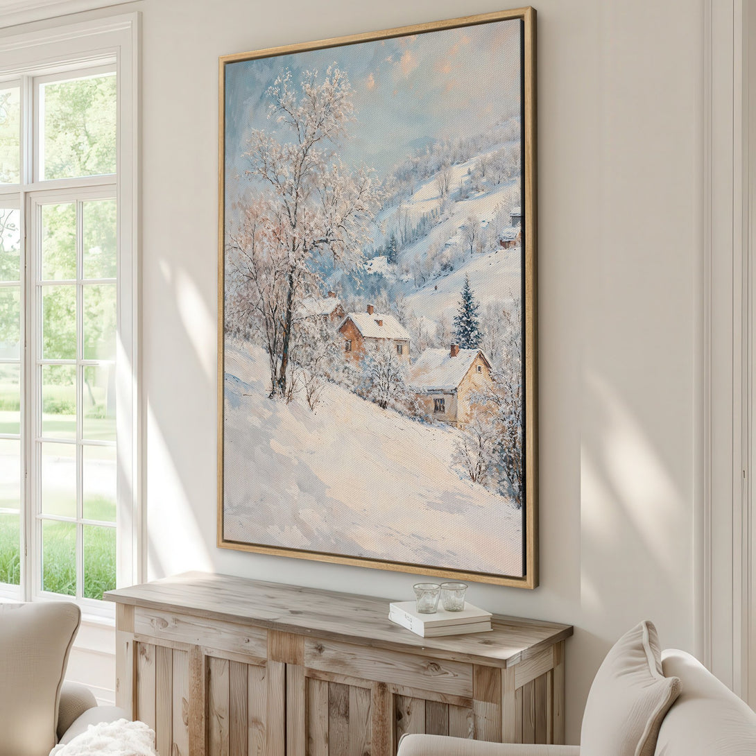 Framed Wall Art: Winter landscape Canvas Print with snowy hills and cozy homes, soft blues, whites, and warm earth tones. Perfect for a cozy home!