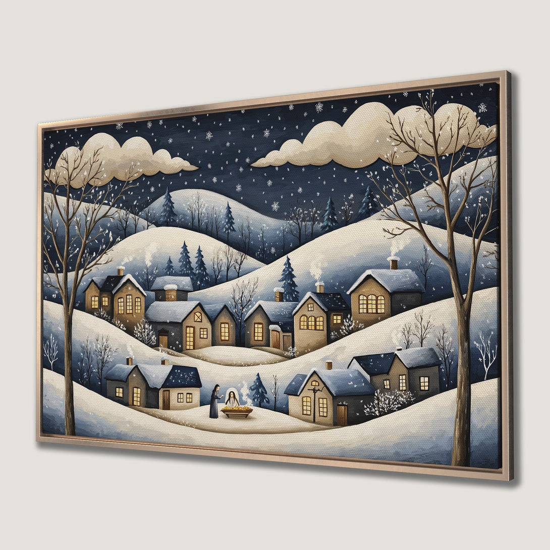 Framed Wall Art of a winter village scene in a whimsical style. Features a blue and beige color palette with snowy hills and cozy homes.