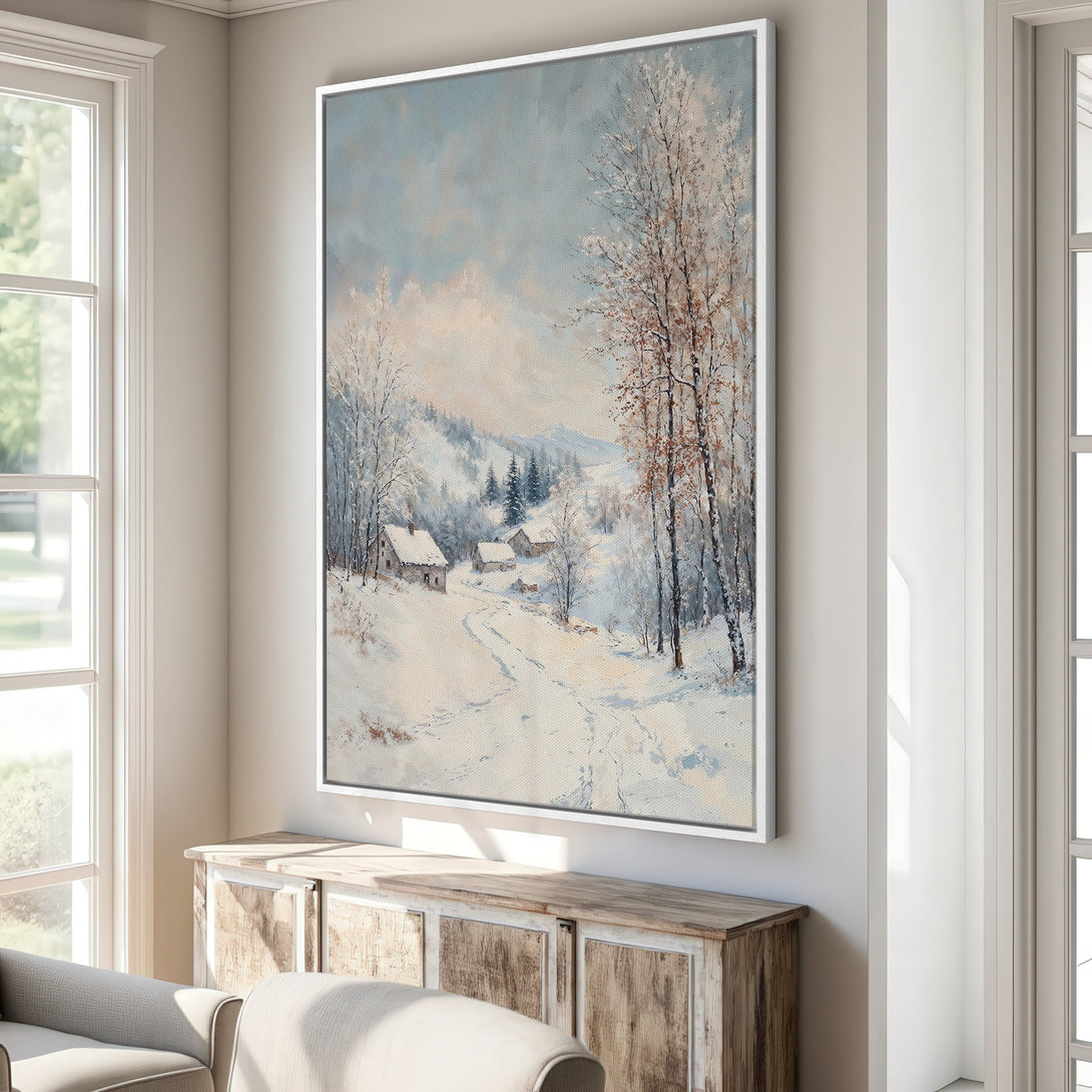 Framed Wall Art: Winter landscape painting in a serene, muted blue and white palette. Classic style with snowy trees and cozy cottages, perfect for home decor.