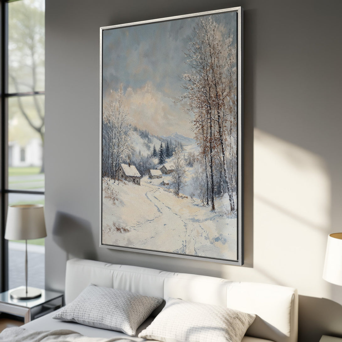 Framed Wall Art: Winter landscape canvas print in cool blues and whites. Rustic painting style depicting snowy scene with houses and trees. Perfect for cozy interiors.