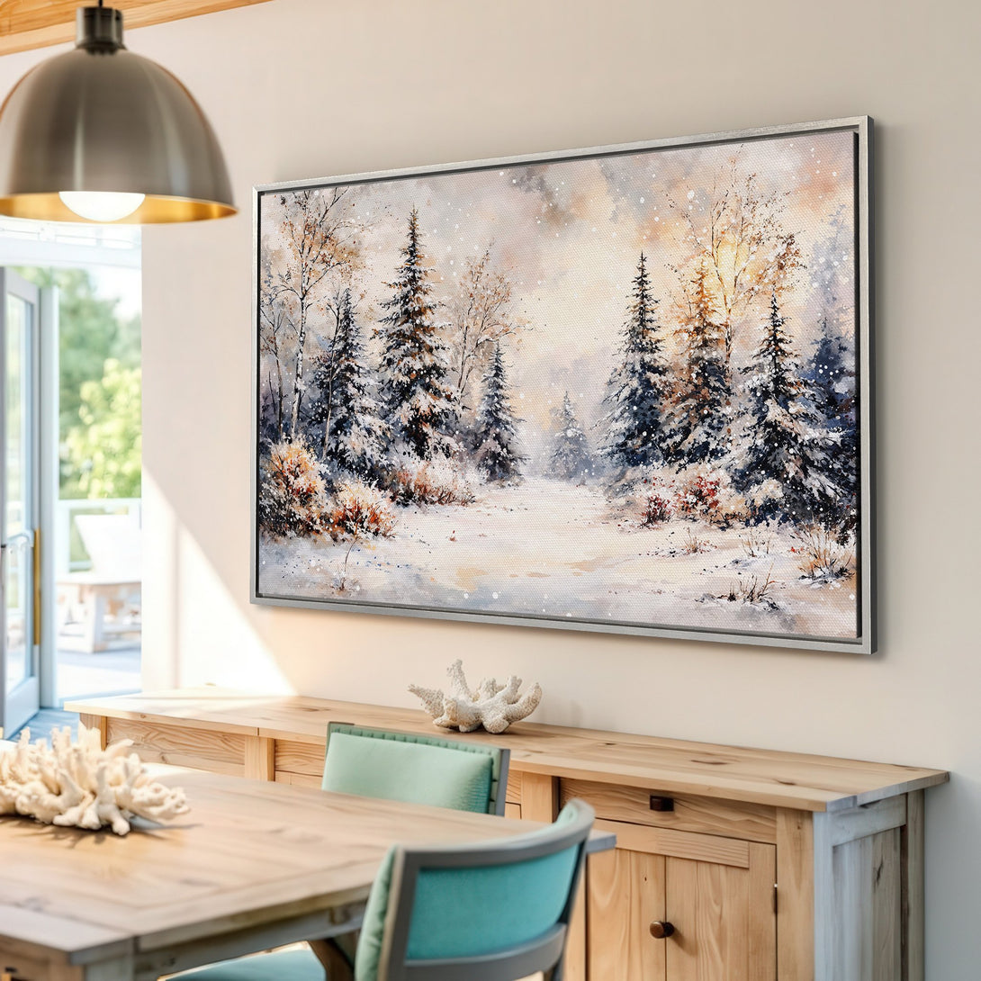 Framed Wall Art: Winter forest scene canvas print in a warm, neutral interior. Features snowy trees and a soft, watercolor-like style with cool and warm tones.