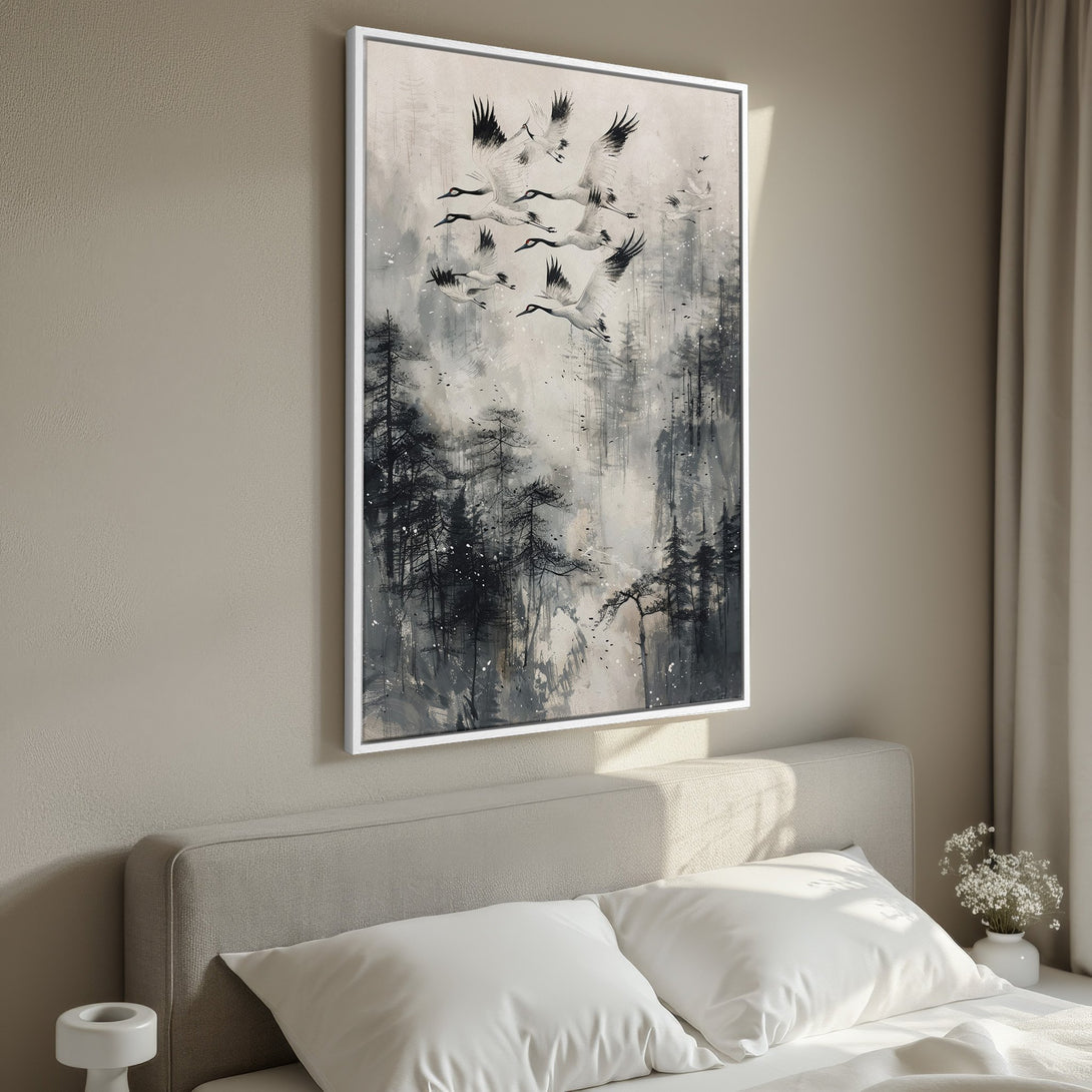Framed Wall Art: Abstract crane painting in muted gray tones. Modern canvas print featuring birds in flight over a misty forest, perfect for bedroom decor.