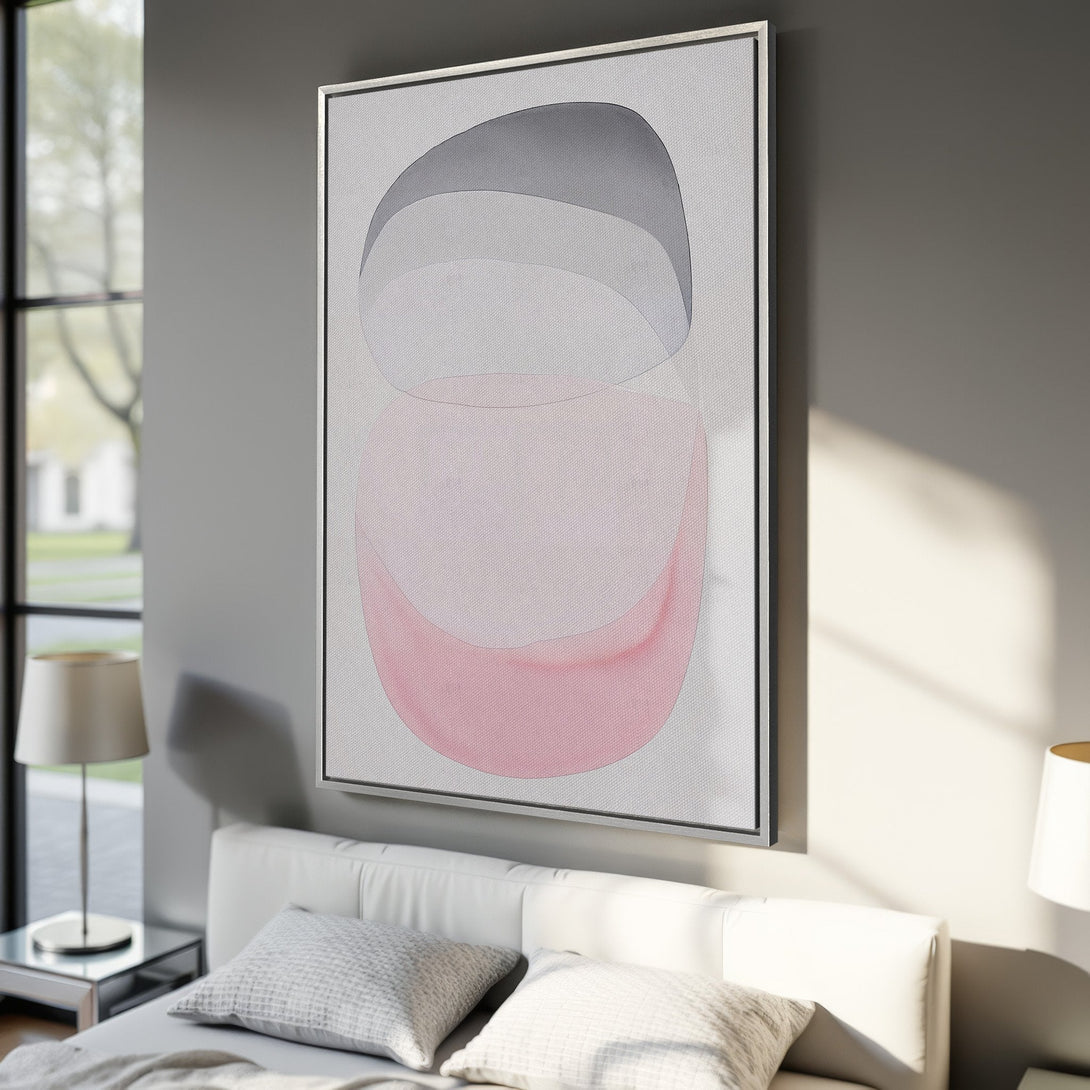 Framed Wall Art: Abstract art print in a modern bedroom. Features soft pink, gray, and white color palette. Elevate your space with this stylish canvas print.