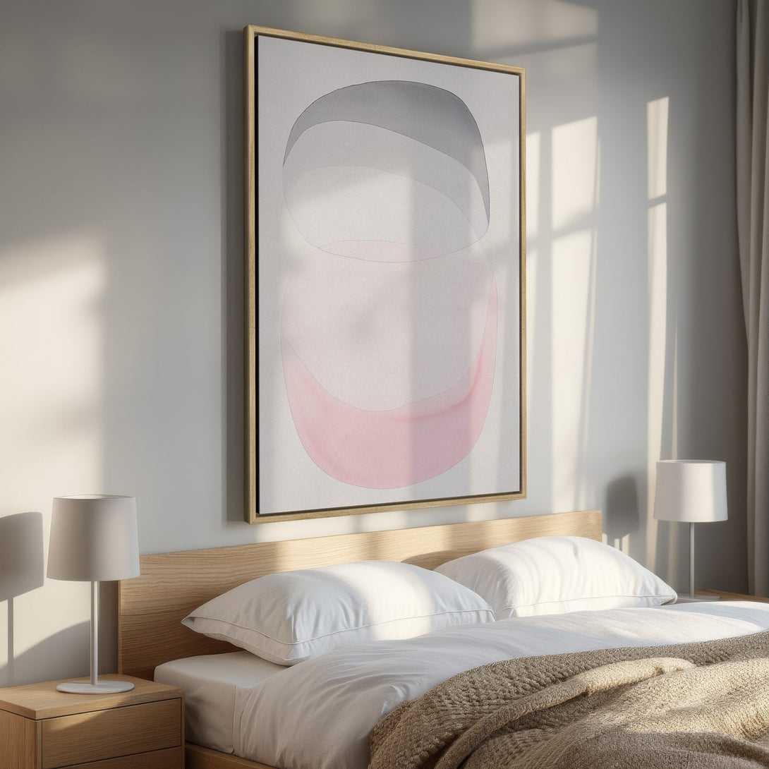 Framed Wall Art featuring an abstract watercolor design in soft pinks, grays, and whites. Perfect for adding a touch of modern elegance to your bedroom decor.