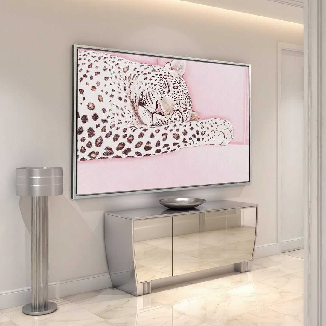 Framed Wall Art: Relaxing leopard print canvas in a modern interior. Soft pink and neutral tones create a stylish and calming atmosphere. Perfect for any room!