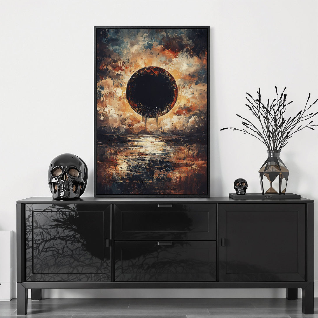 Framed Wall Art featuring an abstract eclipse scene in a moody, dark style with an orange and brown color palette. Perfect for modern home decor.