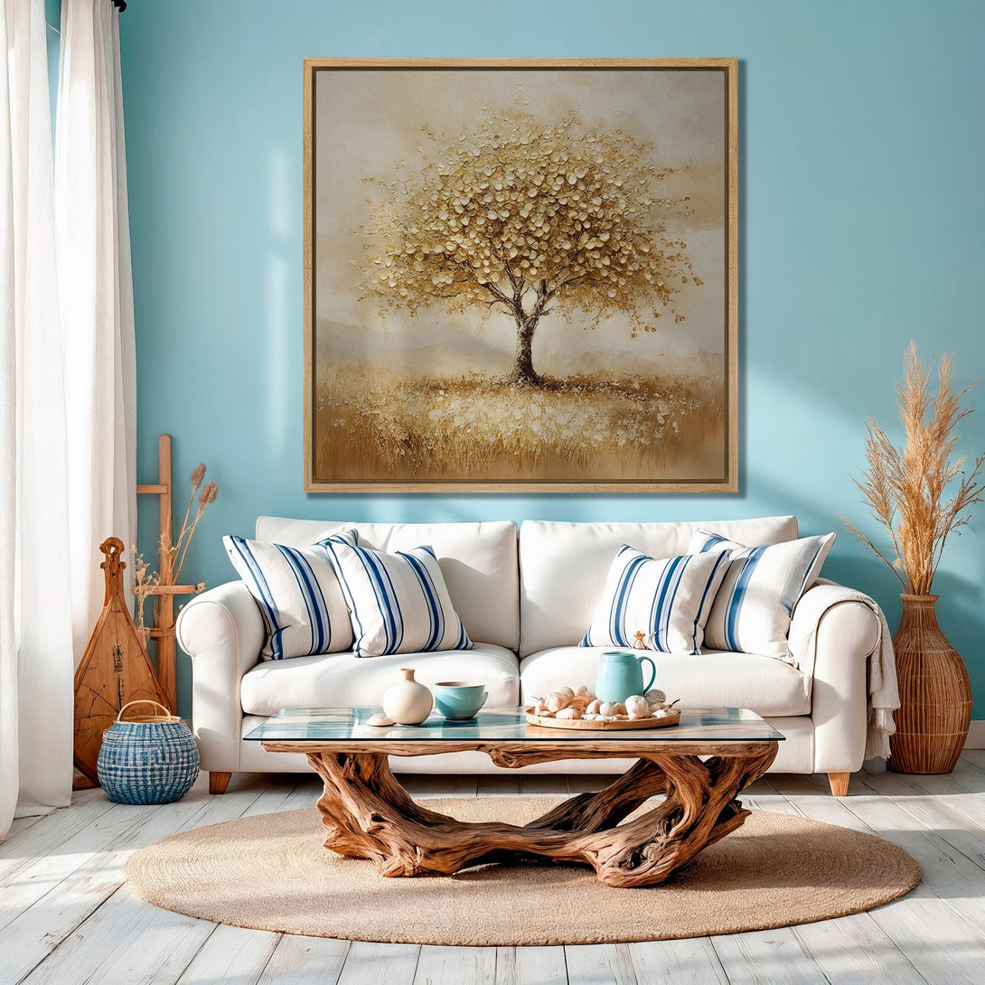 Framed Wall Art: Golden tree painting in a serene living room. Warm, neutral color palette with pops of blue. Perfect for adding a touch of nature's beauty.