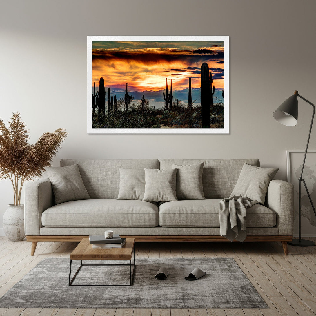 Framed Poster: Desert sunset art print with cacti silhouettes, warm orange and yellow tones, perfect for home decor.