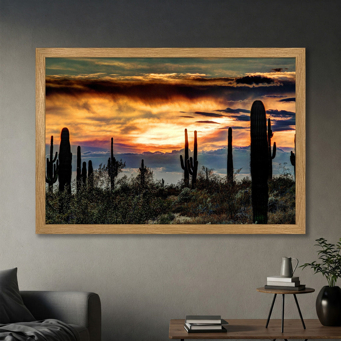 Framed Poster of a desert sunset with cacti. Warm color palette, landscape art. Perfect wall decor for home or office.