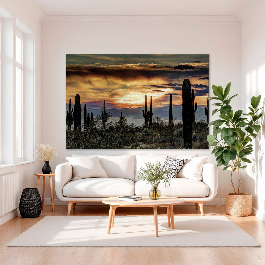 Framed Wall Art featuring a desert sunset with cacti. Warm, vibrant colors create a stunning landscape. Perfect for adding a touch of nature to your home.