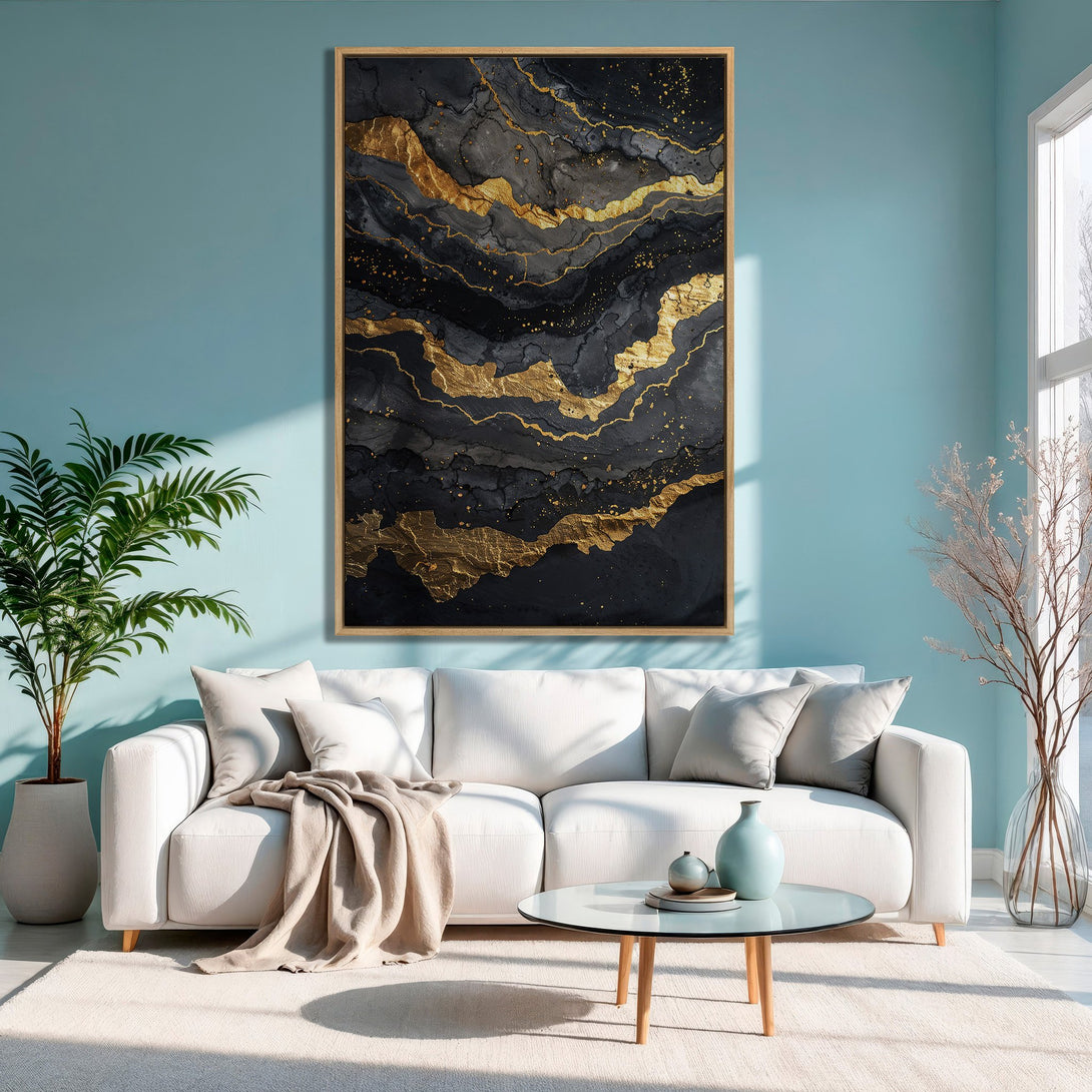 Framed Wall Art: Abstract black and gold canvas print, modern style, displayed in a stylish living room with a teal wall. Elevate your space!
