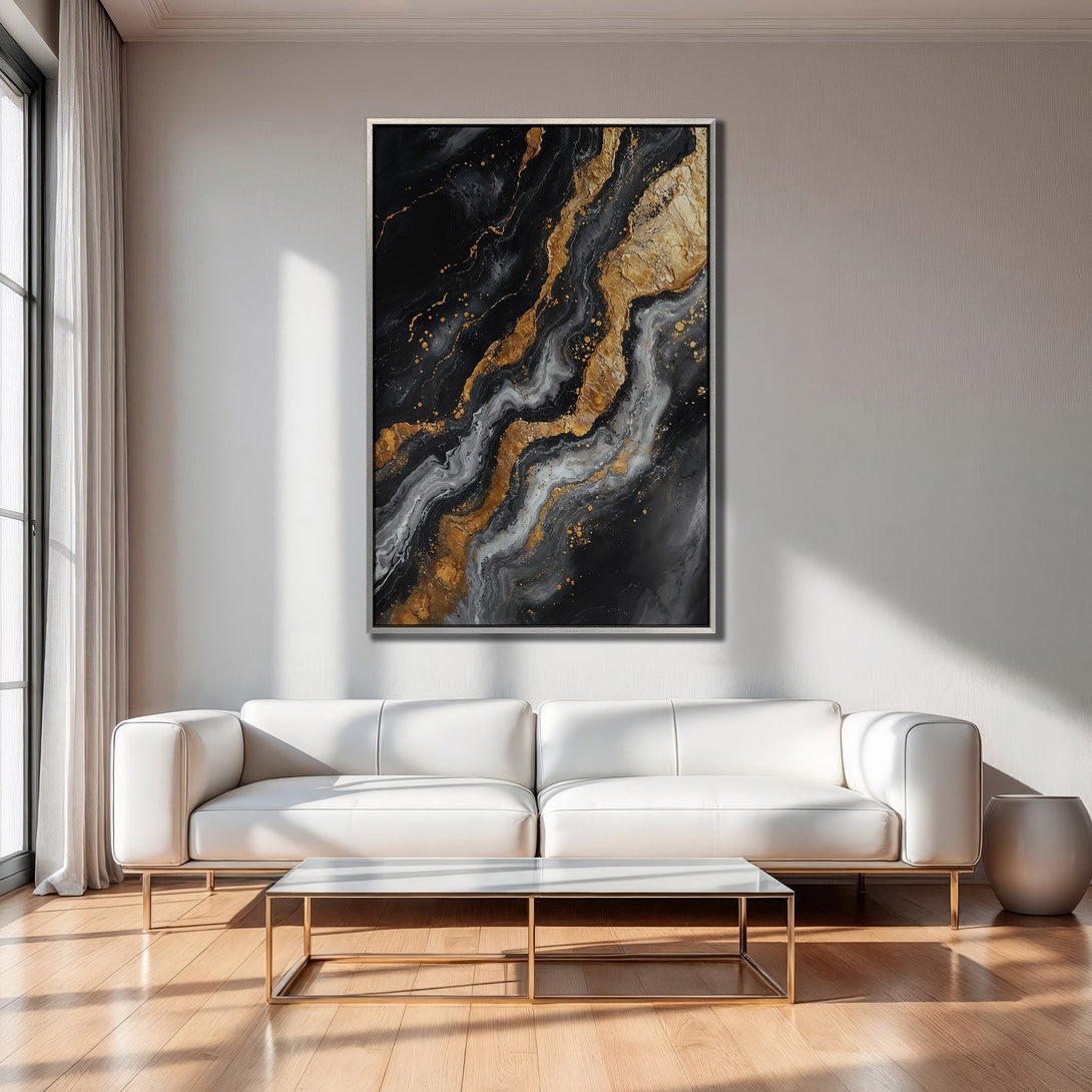 Framed Wall Art featuring an abstract black & gold design. Modern art canvas print with a luxurious, elegant feel. Perfect for living room decor.