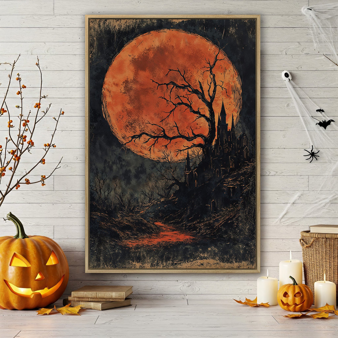 Framed Wall Art of a spooky Halloween scene with a blood moon, castle, and trees in a vintage style. Features orange, black, and dark tones.