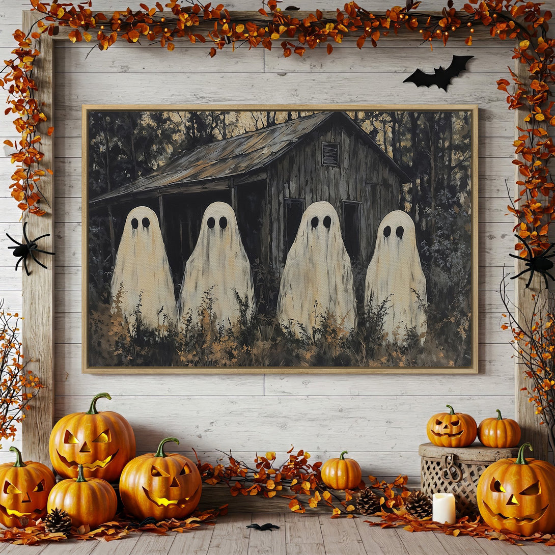 Framed Wall Art: Spooky Halloween ghosts painting in neutral tones. Perfect fall decor for a haunted house vibe!