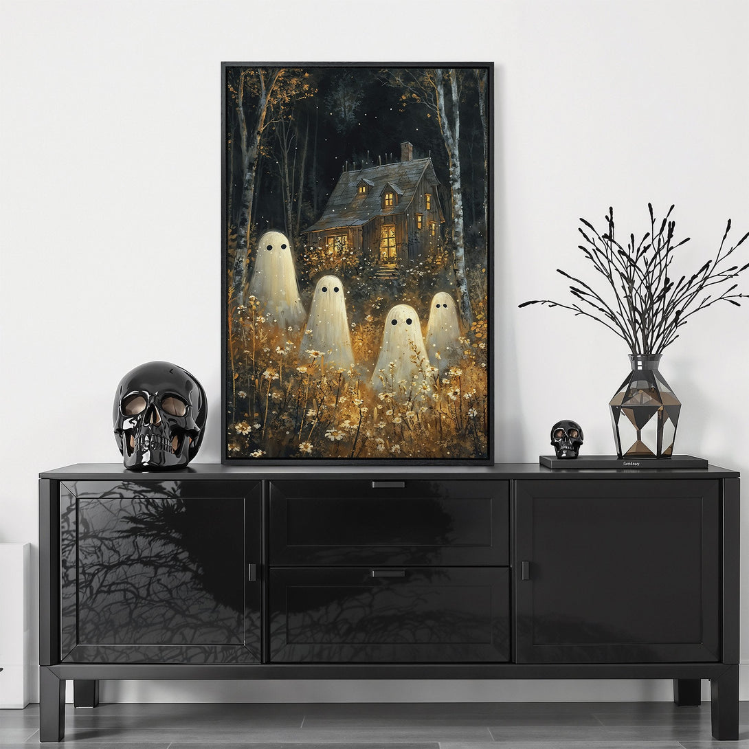 Framed Wall Art featuring a whimsical ghost scene in a dark forest with warm gold and black tones. Perfect Halloween decor!
