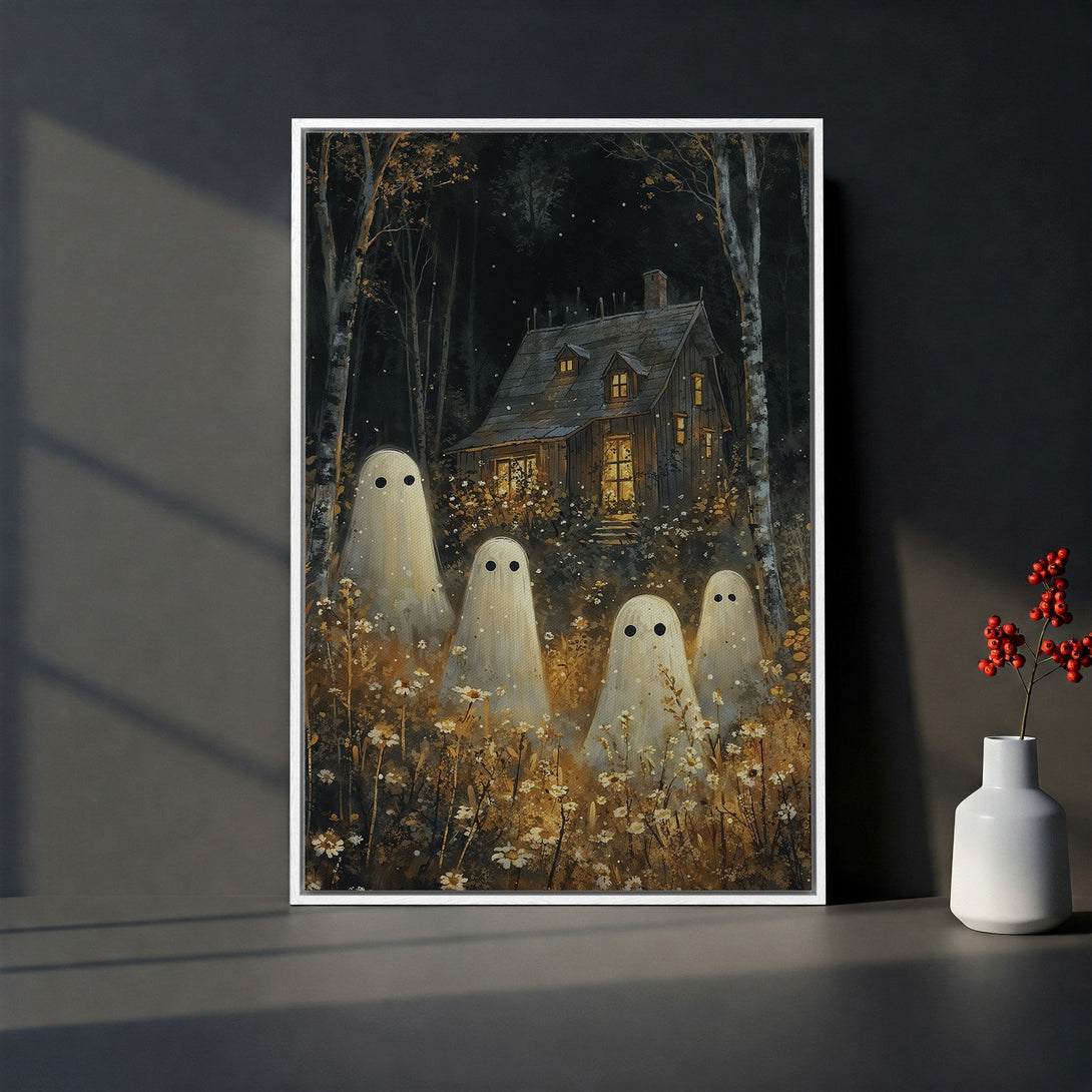Framed Wall Art featuring spooky ghosts & a haunted house in a dark, whimsical style. Earthy tones with pops of white and gold. Perfect Halloween decor!