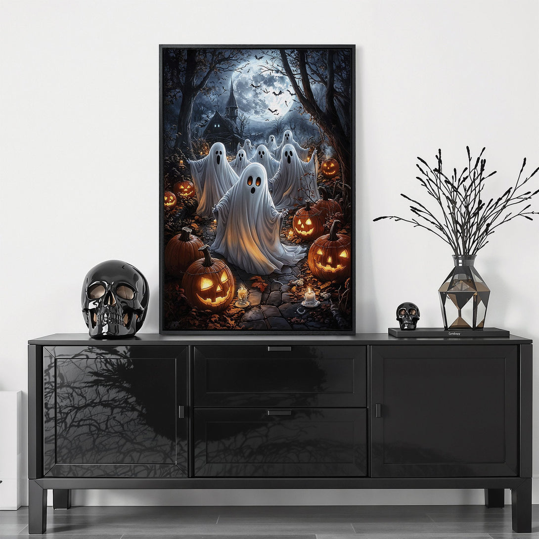 Framed Wall Art: Spooky Halloween scene with ghosts, pumpkins, and a full moon. Dark, moody color palette perfect for seasonal decor. Add a touch of fright!
