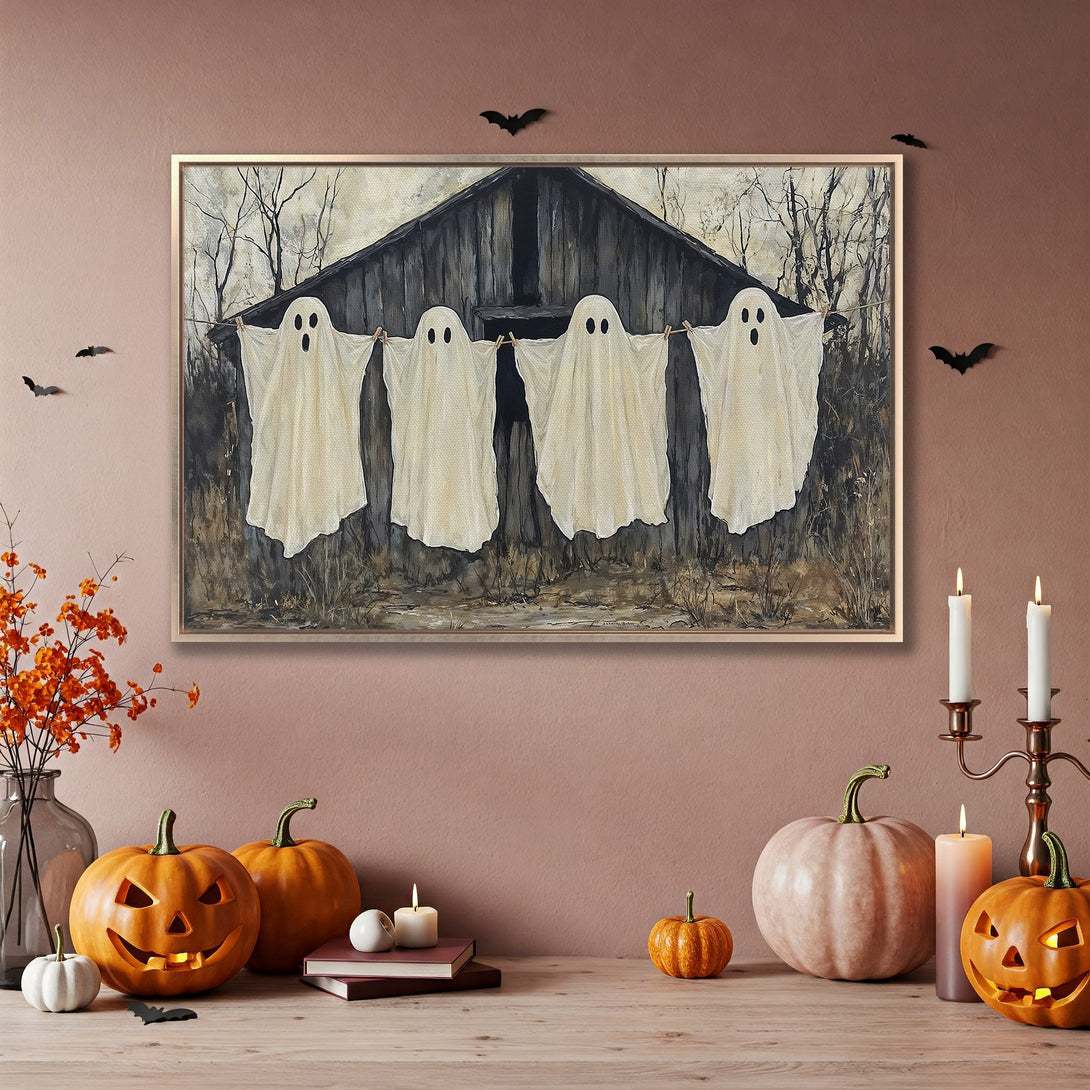 Framed Wall Art featuring whimsical Halloween ghosts, rustic style, with neutral and muted color palette. Perfect spooky decor for your home.