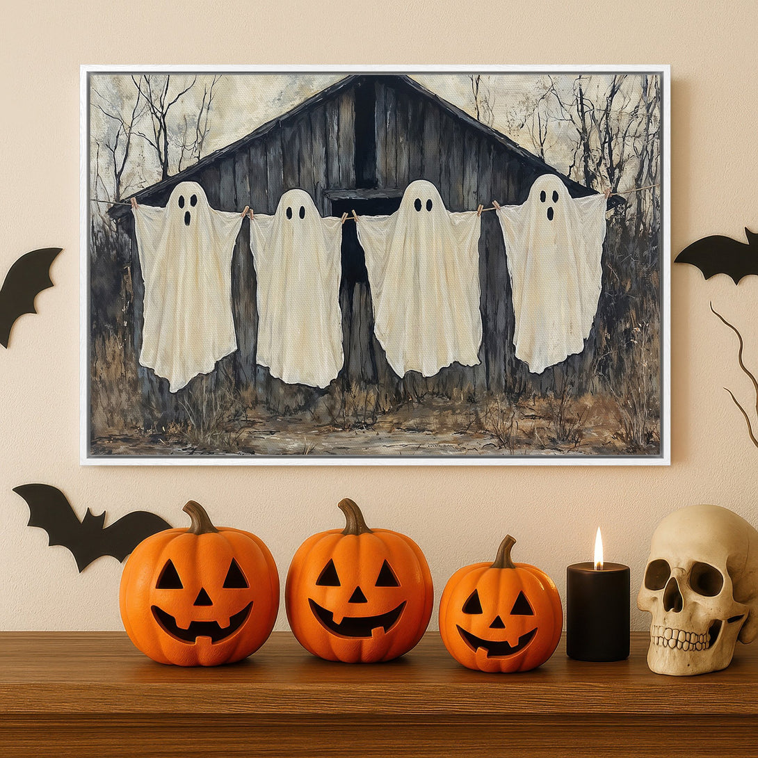Framed Wall Art: Spooky Halloween ghosts hanging on a line. Neutral color palette. Perfect for adding a touch of eerie charm to your home decor.