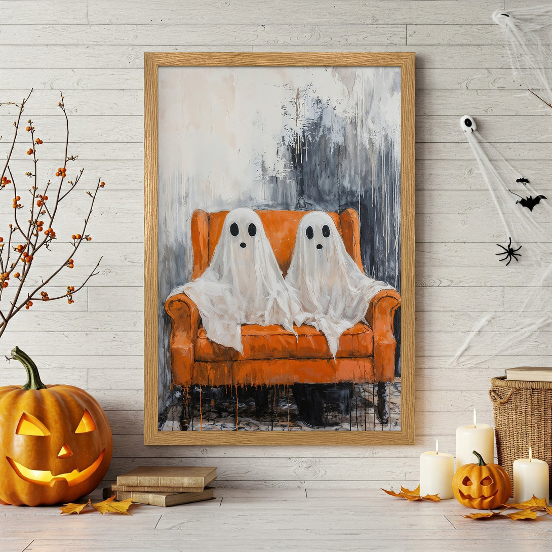 Framed Poster featuring whimsical ghosts on an orange chair. Abstract style with a white, gray, and orange color palette. Perfect Halloween decor!