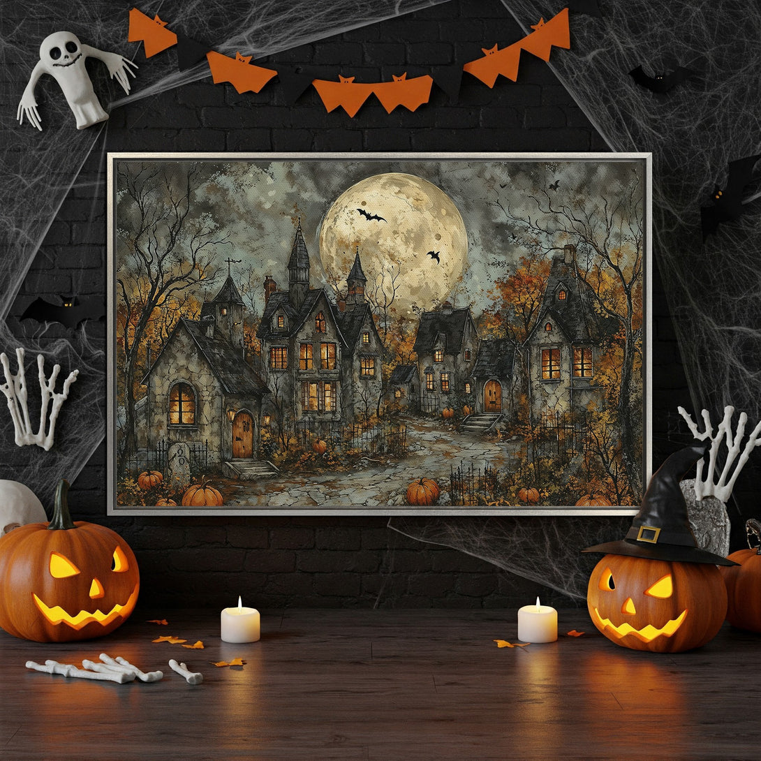 Framed Wall Art: Spooky Halloween village scene with a full moon. Gothic style with a muted orange, grey, and yellow color palette. Perfect for seasonal decor.