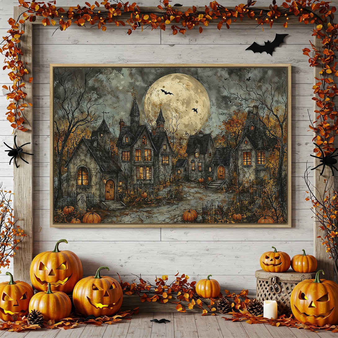 Framed Wall Art: Spooky Halloween scene with a full moon, haunted houses, and autumn colors. Perfect for seasonal decor!