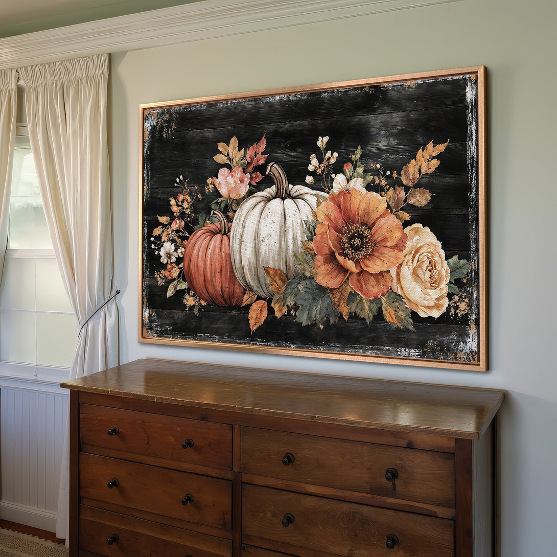 Framed Wall Art featuring pumpkins and floral arrangement in warm autumn colors. Rustic style canvas print perfect for fall decor.