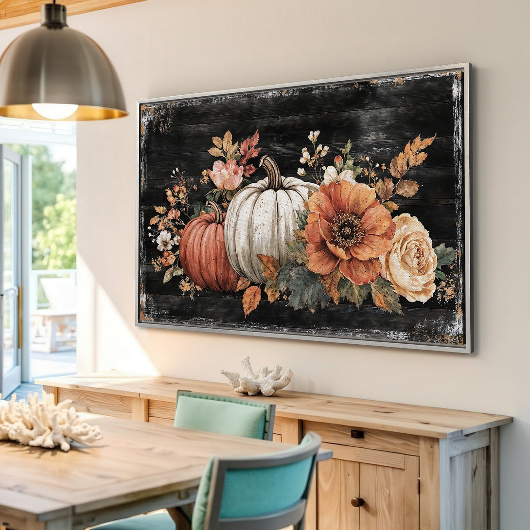Framed Wall Art: Rustic pumpkin and floral print in warm orange, cream, and brown tones. Perfect autumn decor for your home.
