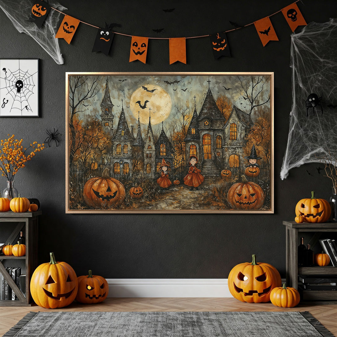Framed Wall Art: Spooky Halloween scene with haunted houses, pumpkins, and witches. Perfect for fall decor! Warm orange and gray color palette.