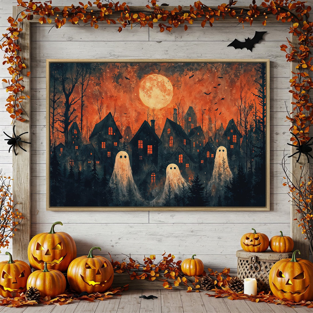 Framed Wall Art: Spooky Halloween scene with ghosts, houses, and a full moon in a warm orange and dark blue color palette. Perfect for fall decor!