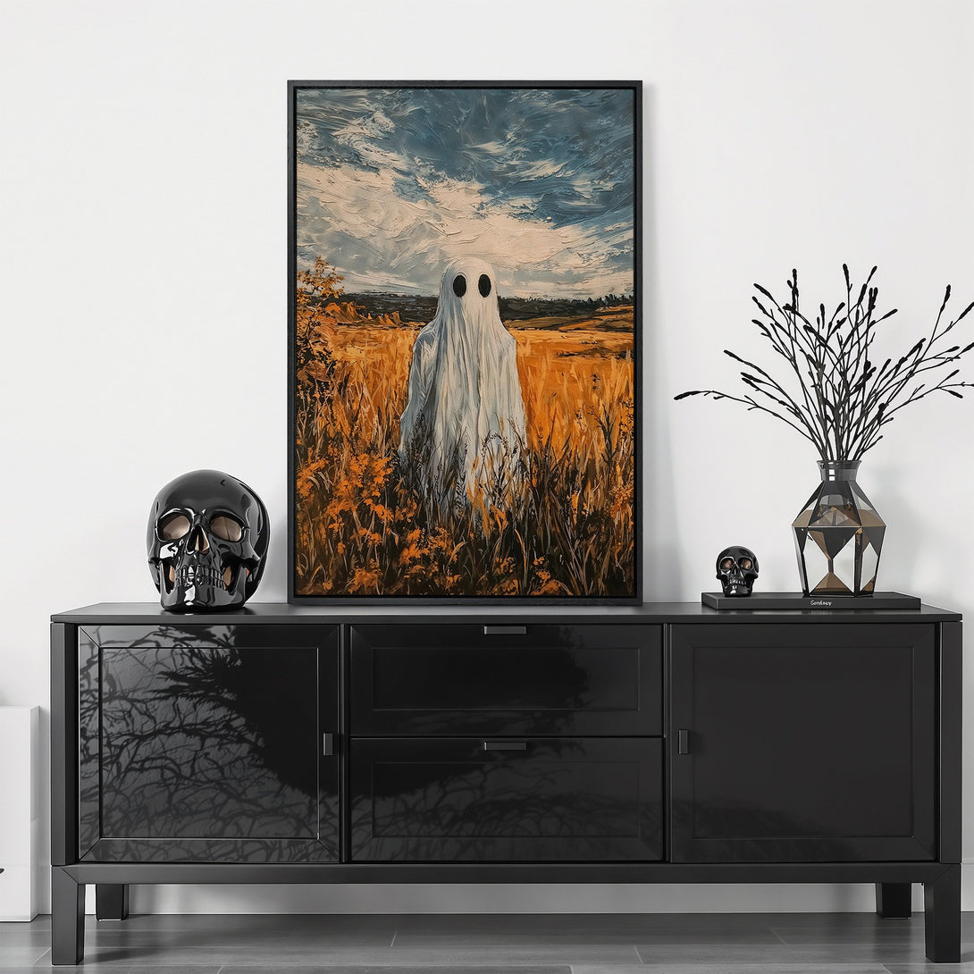 Framed Wall Art featuring a whimsical ghost in a field, with a moody, painterly style and a warm, autumnal color palette. Perfect for adding a touch of spooky charm.