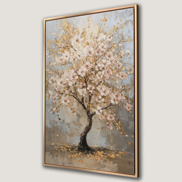 Framed Wall Art featuring a blossoming tree with a soft pink and gold color palette. Perfect for adding a touch of elegance to your home decor.
