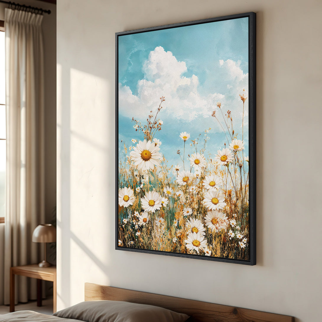 Framed Wall Art: Daisy field canvas print with blue sky, white clouds, and warm color palette. Perfect for adding a touch of nature to your home!