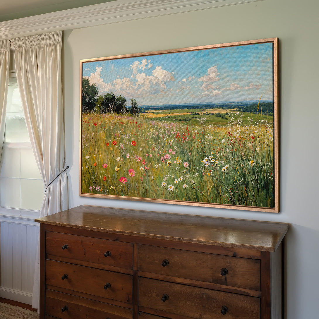 Framed Wall Art of a vibrant wildflower meadow scene, in a classic, impressionistic style with a warm, natural color palette.