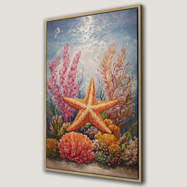 Framed Wall Art featuring a vibrant starfish and coral reef scene. Beautiful underwater painting in warm orange, pink, and blue tones. Perfect coastal decor!